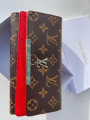 Louis Vuitton brown Wallet for classy women with red color
