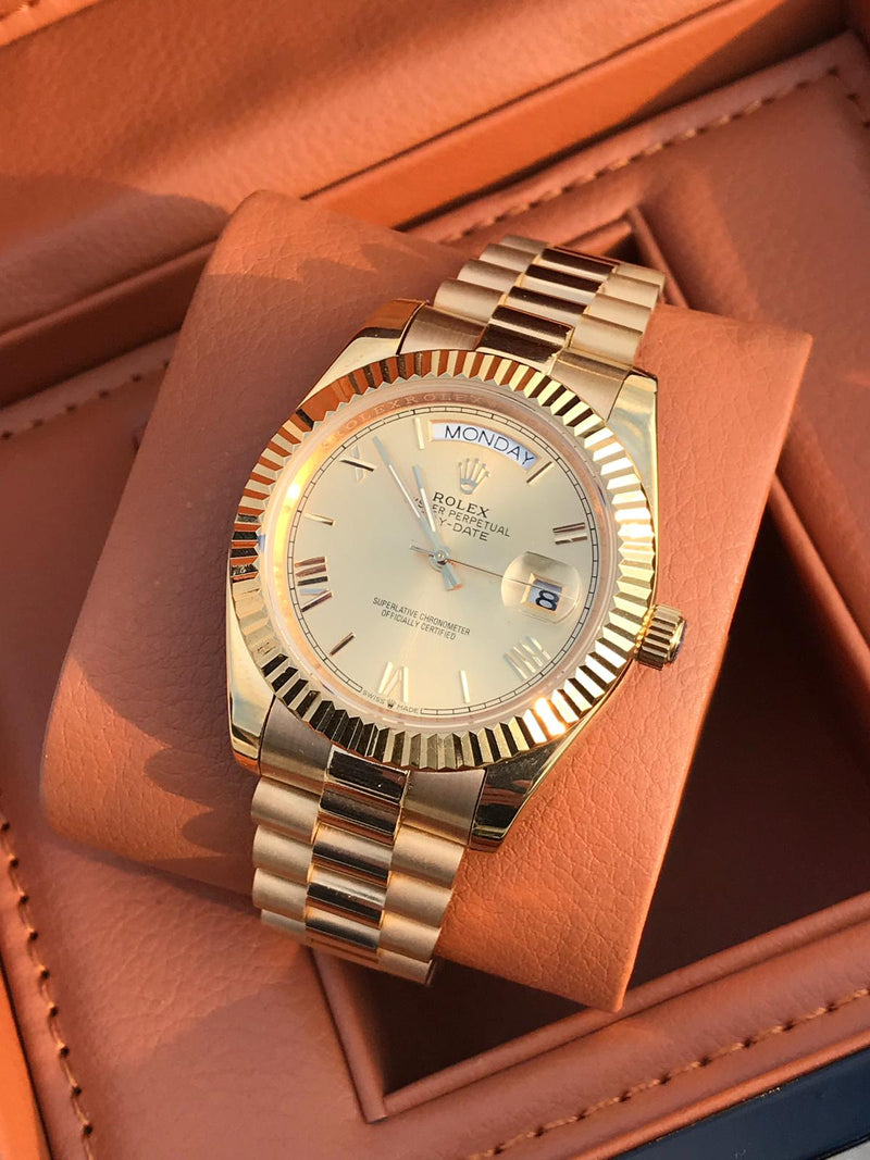 Rolex Daydate gold Roman Numerals