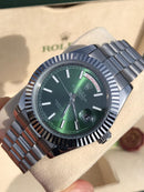Rolex Daydate with green dial