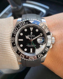 Rolex green GMT master II with black strap