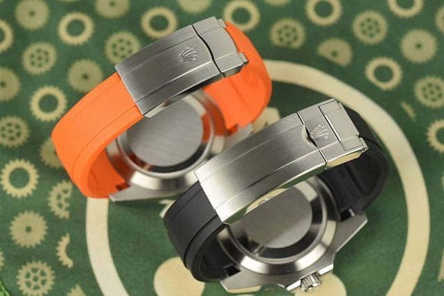 Rolex black submariner with orange strap