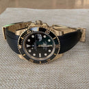 Rolex black submariner with green strap