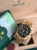 Rolex GMT Master ll Gold & black dial