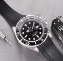 Rolex red sea dweller with black strap