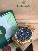 Rolex GMT Master ll Gold & black dial