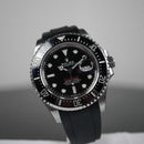 Rolex red sea dweller with black strap