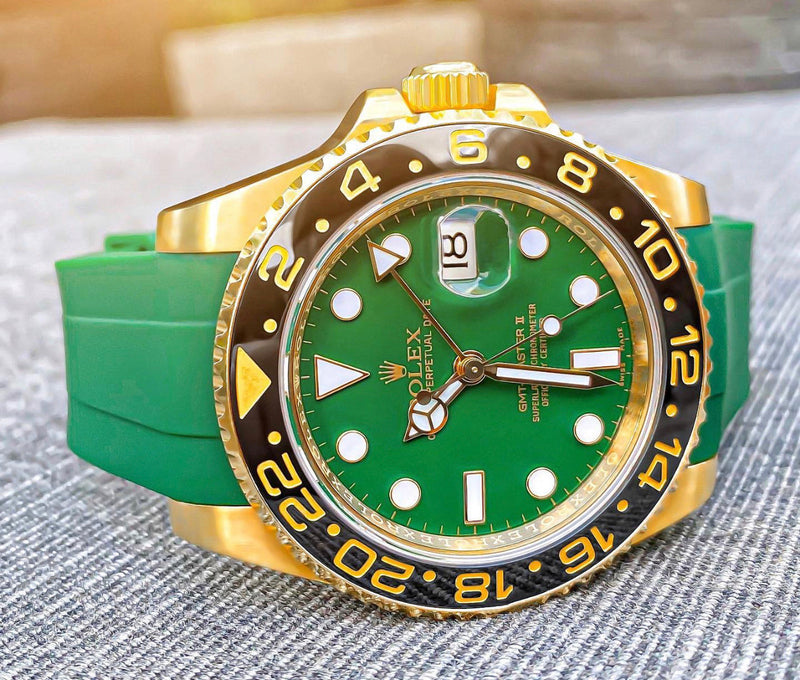 Rolex  GMT master II rosegold with black strap