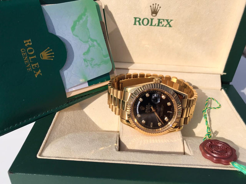 Rolex Daydate Gold with black dial