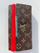 Louis Vuitton brown Wallet for classy women with red color