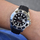 Rolex red sea dweller with black strap