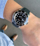 Rolex red sea dweller with black strap