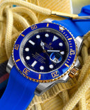 Rolex black bicolour submariner with blue strap