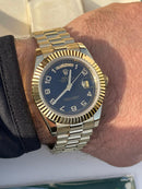 Rolex Daydate Gold with black dial