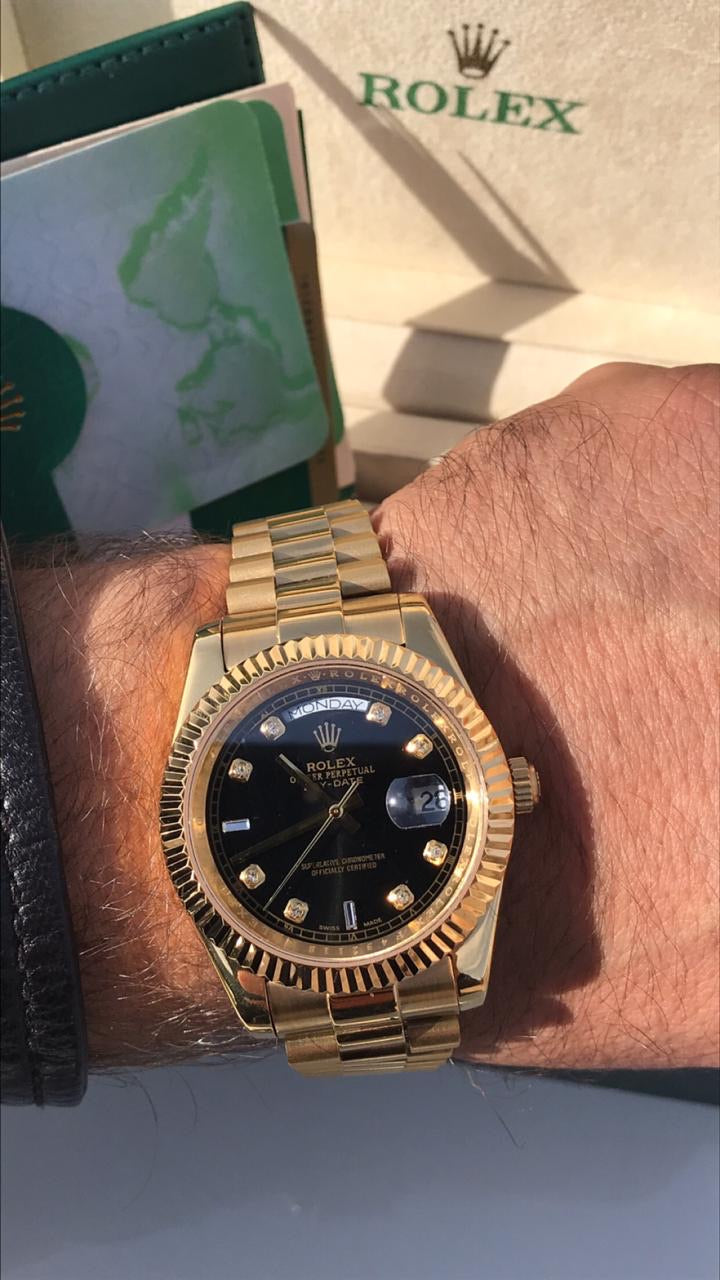 Rolex Daydate Gold with black dial