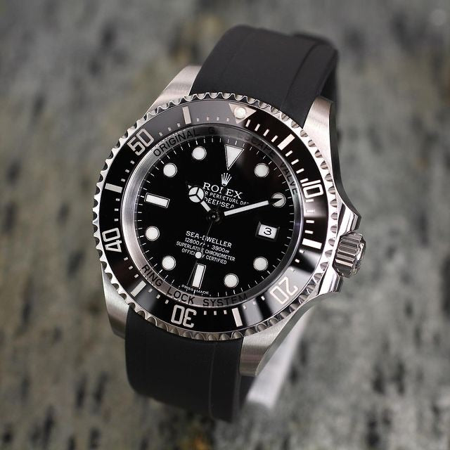 Rolex black sea dweller with black strap
