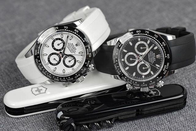 Rolex Black Daytona with white strap