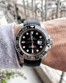 Rolex green GMT master II with black strap