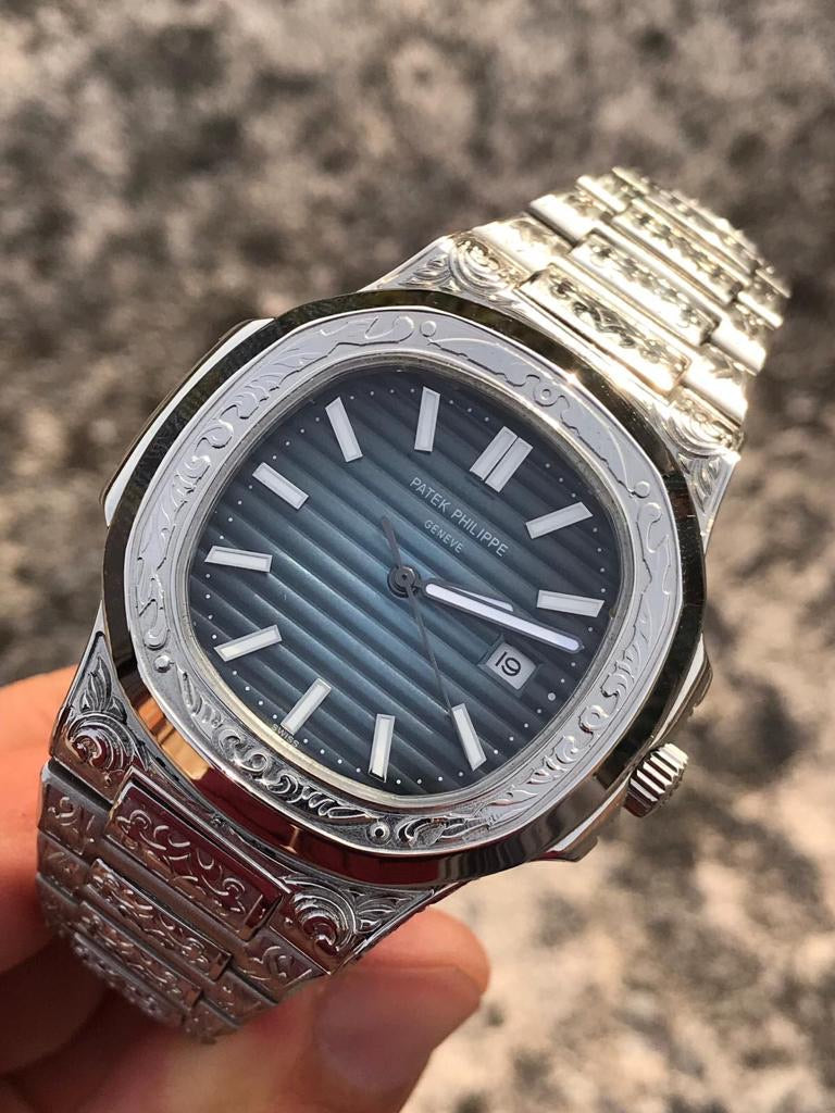 Patek Philippe Nautilus engraved Blue diamonds