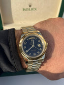 Rolex Daydate Gold with black dial