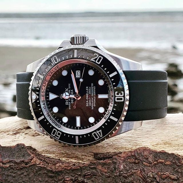 Rolex black sea dweller with black strap
