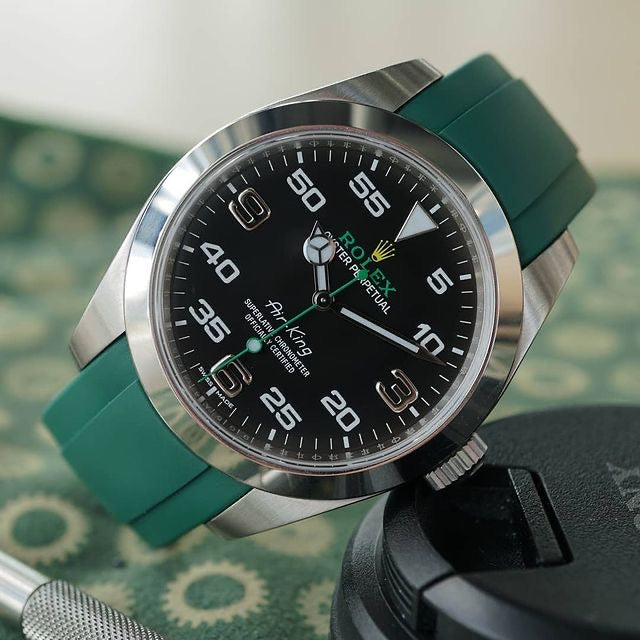 Rolex Ouester submariner with green strap
