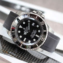 Rolex black sea dweller with black strap