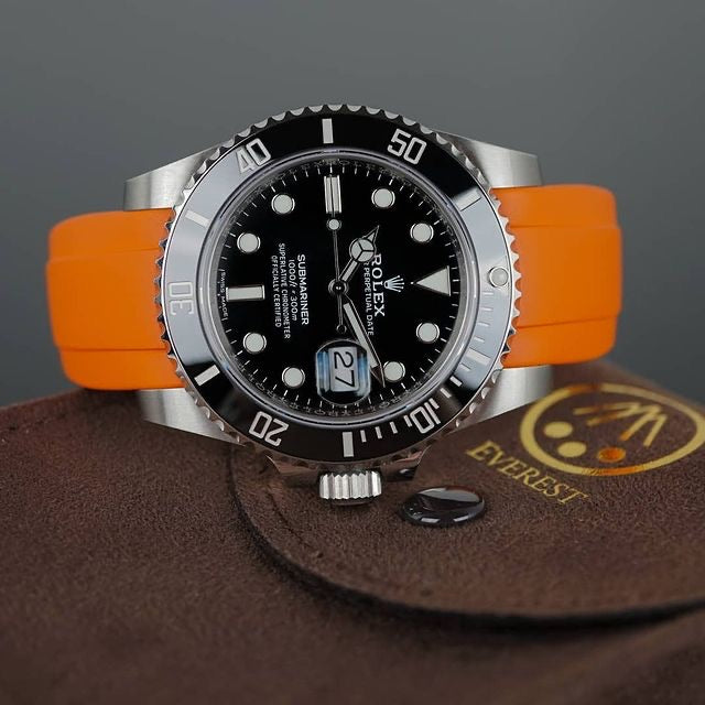 Rolex black submariner with orange strap