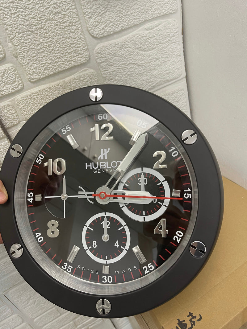 Hublot black wall clock