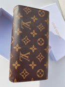 Louis Vuitton brown Wallet for classy women with red color