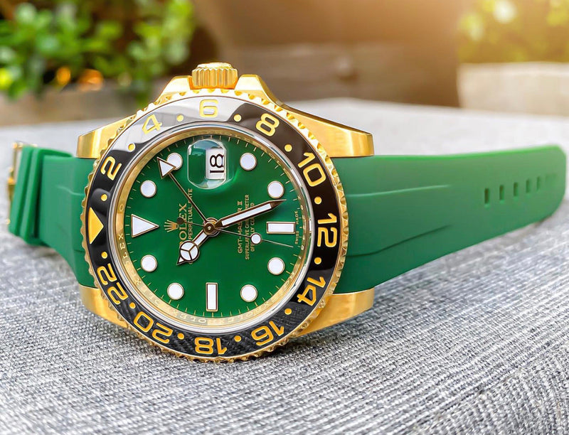Rolex  GMT master II rosegold with black strap