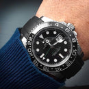 Rolex green GMT master II with black strap