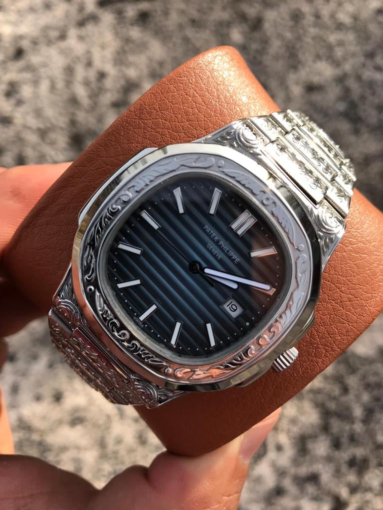 Patek Philippe Nautilus engraved Blue diamonds