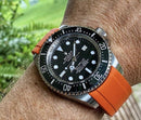 Rolex orange sea dweller with black strap