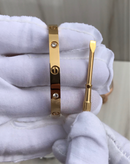 Gold Cartier bracelet